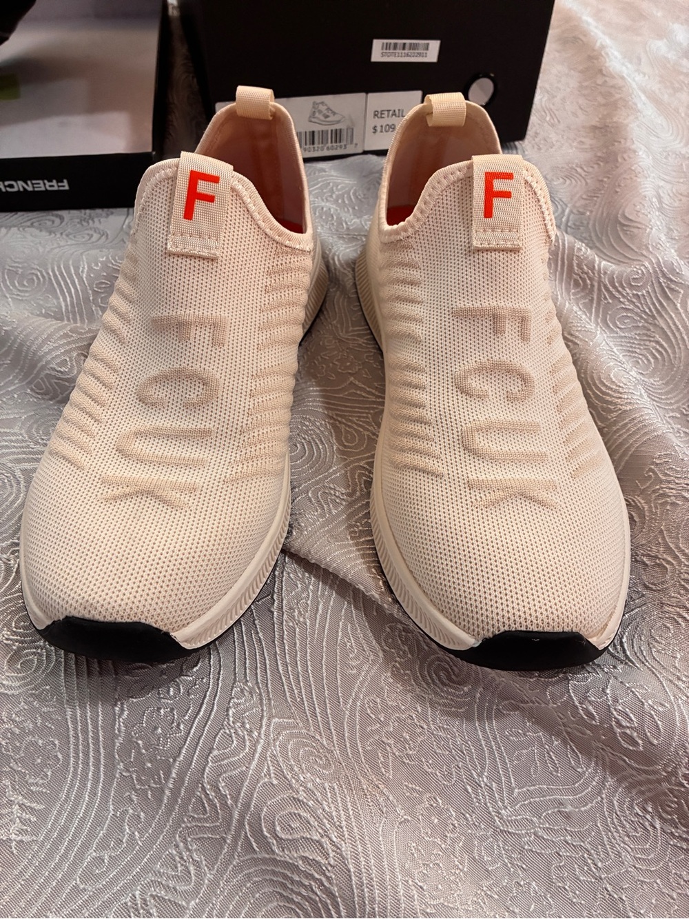 French Connection Men's Slip-On Knit Sneakers in Cream with Red Accent